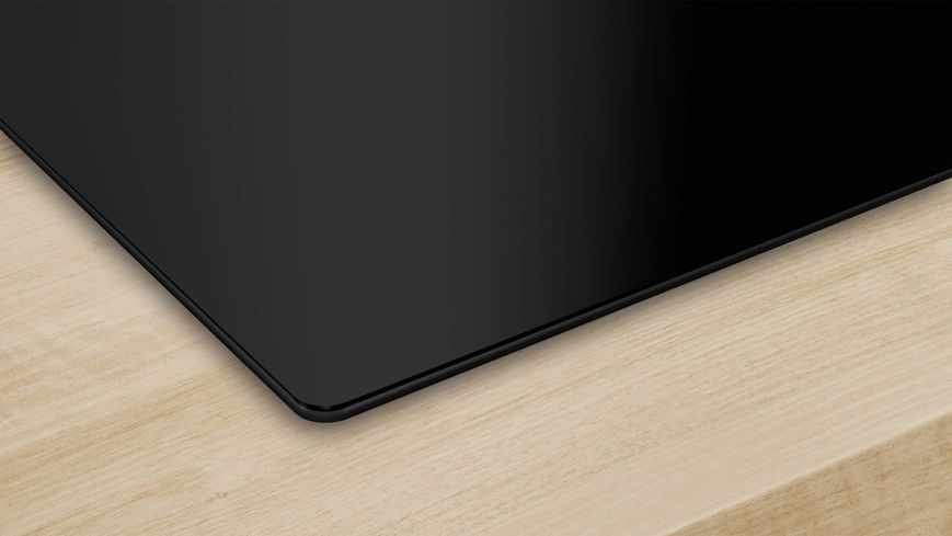 Індукційна варильна поверхня Bosch PUE611BB5E фото