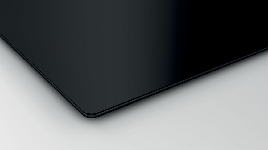 Індукційна варильна поверхня Bosch PUE611BB5E фото